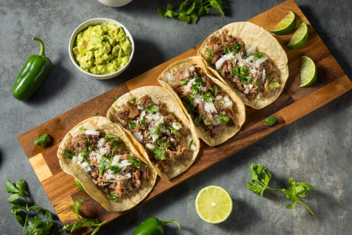 Homemade Pork Carnitas Tacos with Cilantro and Onion