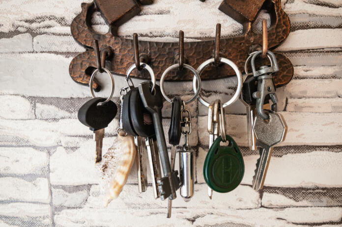 Key holder with keys hanging on the wall