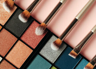Slovenija dobila prvi magistrici kozmetike Make-up palette and brushes. Professional eyeshadow palette. Close up.