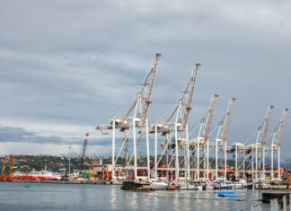 Kadrovske štipendije Luke Koper za dijake in študente Picture of the panorama of Luka koper, the port of koper, with industrial cranes. Port of Koper is a public limited company, which provides port and logistics services in the only Slovenian port, in Koper. It is situated in the northern part of the Adriatic Sea, mainly connecting markets of Central and Southeast Europe with the Mediterranean Sea and Far East. Unlike other European ports, which are managed by port authorities, the activities of Port of Koper comprise the management of the free zone area, the management of the port area and the role of terminal operator. It is currently the main port that serves the route between Adriatic sea and Central Europe.