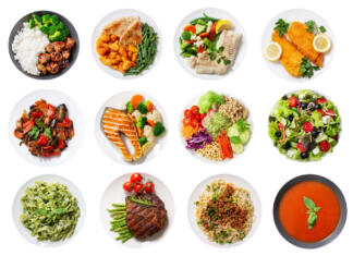 Jernej Ogrin – »Zdrava prehrana, kaj je to?« set of plates of food isolated on a white background, top view