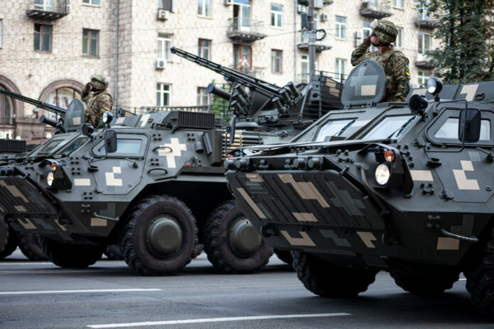 Ukraine, Kyiv - August 18, 2021: Military parade. Armored vehicle. Transport in protective colors. Army vehicles SUVs