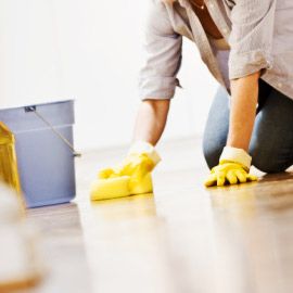 cleaning the floor on knees