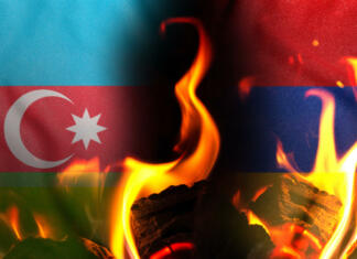 Do kje seže azerbajdžanski in armenski konflikt? Conceptual photo with the flags of Azerbaijan and Armenia during the aggravation of relations between them 2021.