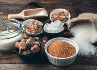 Resnica o nadomestkih sladkorja – 2. del Many different types of sugar on a wooden background. Side view. Culinary background with vintage tinting. The concept of food products.