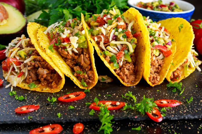 Mexican food - delicious taco shells with ground beef and home made salsa.