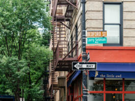 New York City, USA - June 22, 2018: Corner of Bedford Street with Grove Street in Greenwich Village, featured in Friends the famous American Television sitcom