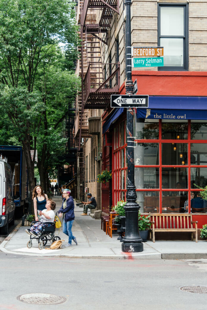 New York City, USA - June 22, 2018: Corner of Bedford Street with Grove Street in Greenwich Village, featured in Friends the famous American Television sitcom