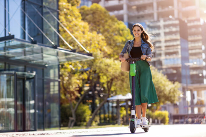 Portrait of beautiful young woman in urban area