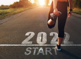 Zapore zaradi maratona v Ljubljani in kako se jih izogniti Sports girl who wants to start the new year 2022. Concept of new professional achievements in the new year and success.