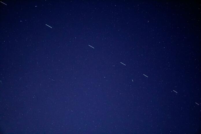 The Starlink 3 train rides across the early morning sky, accompanied by a handful of other satellites.