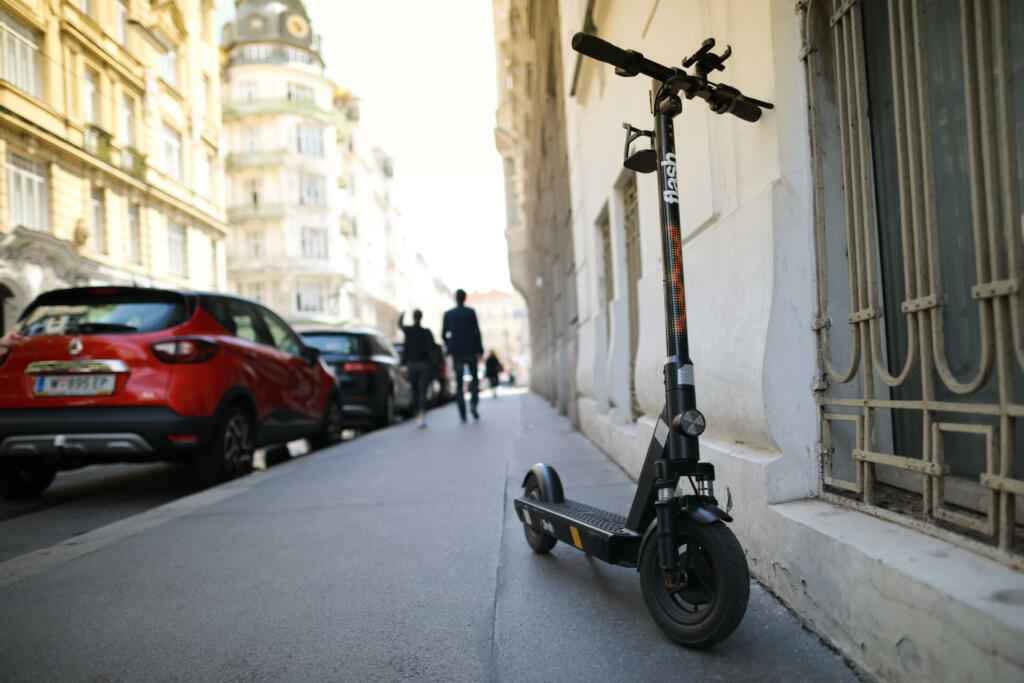 Vienna,Austria-20 may 2019: Electric scooter for rent on street in centre Vienna in sunny day