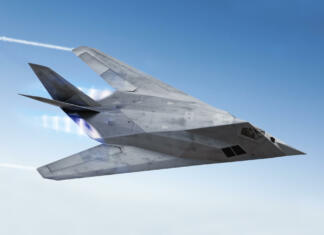 ZDA razkrile novi jedrski bombnik F-117 streaking through the sky with afterburners and vapor trails.