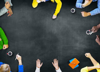 Kdo bo pripravil nacionalni program vzgoje in izobraževanja naslednjih 10 let? Group of Diverse Multiethnic People Brainstorming