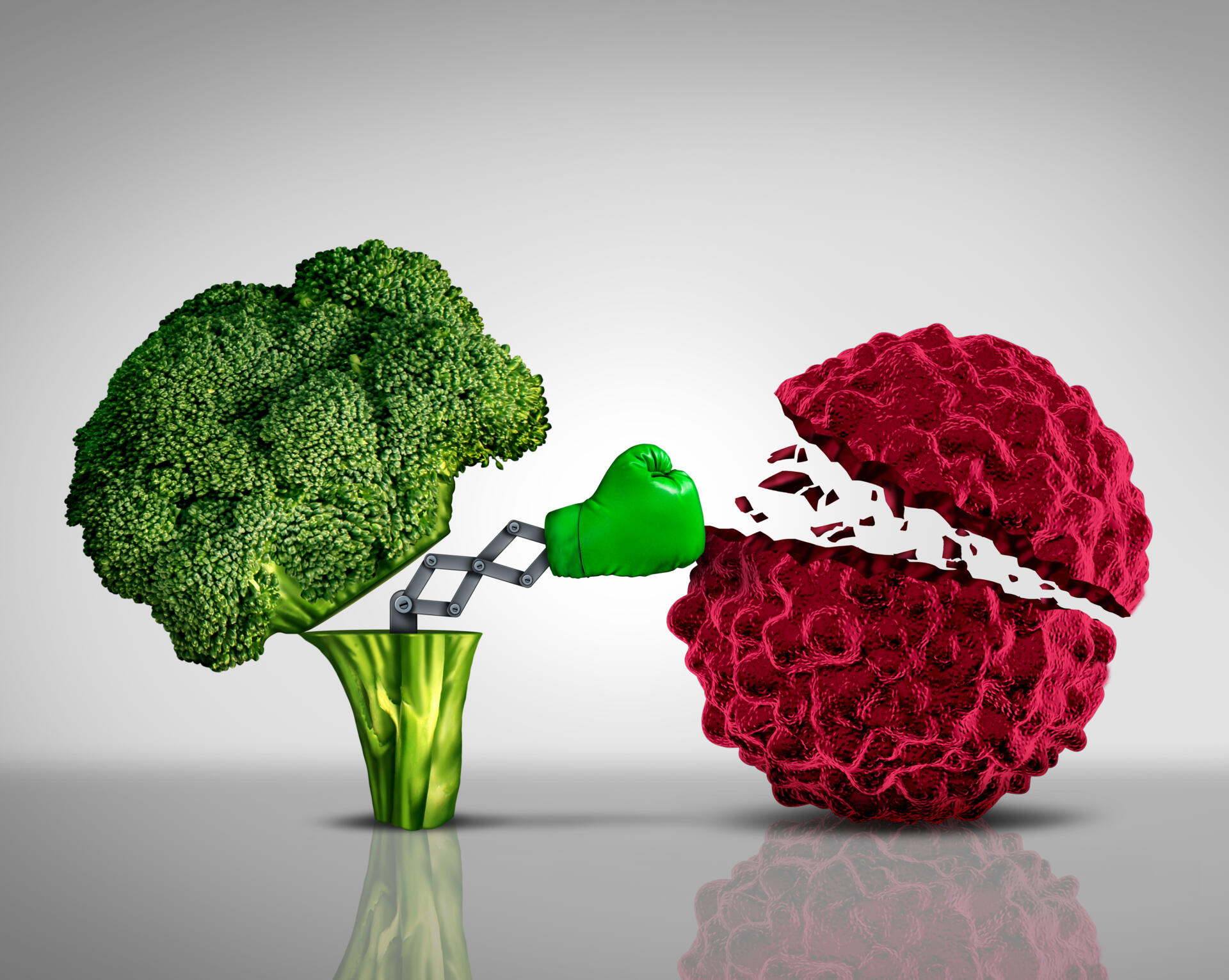 Health food and Cancer fighting foods nutrition concept with a green boxing glove emerging out of an open broccoli vegetable as a health care metaphor for a healthy lifestyle diet rich in natural fruit and vegetables to attack tumors and fight illness.