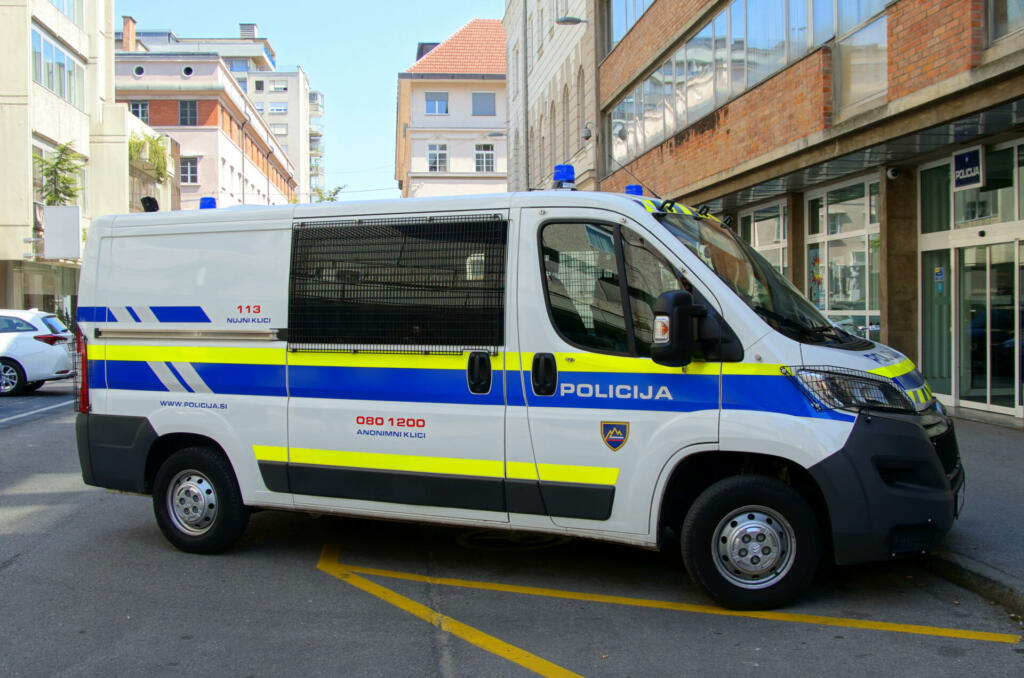 Ljubljana, Republic of Slovenia -  August 5, 2017: Slovenian National Police van (Policija), parked on a public parking lot in city of Ljubljana.