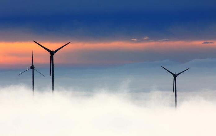 windmills, clouds, fog