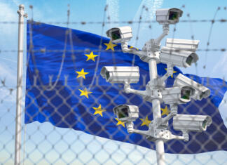 Bi morale biti države bolj samozadostne? 1. del Flag of Europen Union EU behind barbed wire fence and cctv cameras. Concept of closing borders from refugees, discrimination and violation of human rights and freedom in EU. 3d illustration