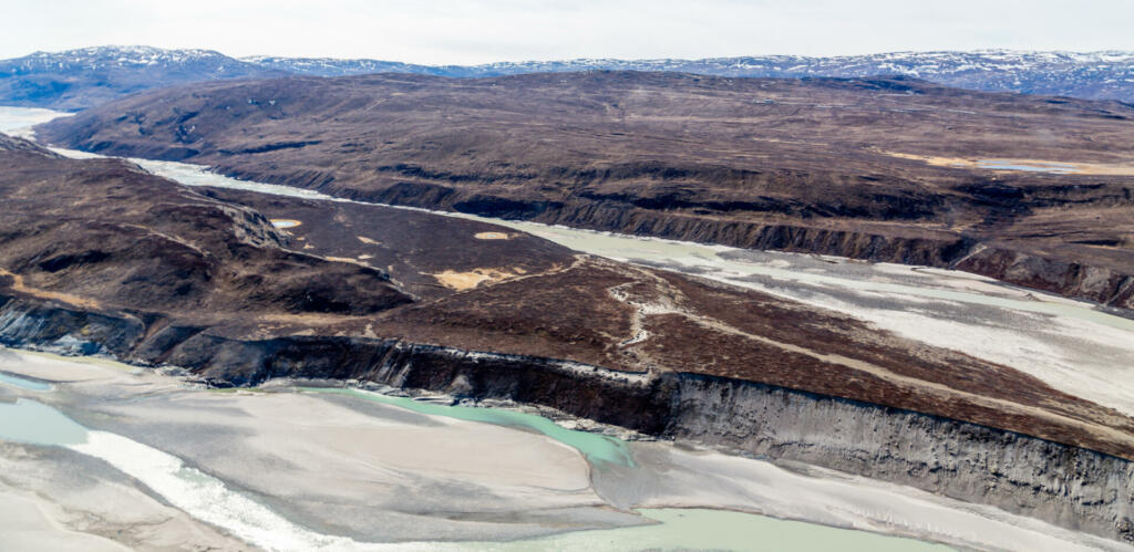 Greenlandic tundra landscape with river from ice cap melting, aerial view, near Kangerlussuaq, Greenland