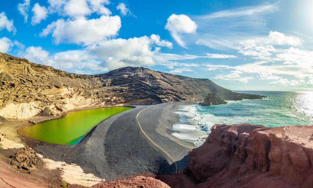 Landscape with unique Lago Verde and black sands at El Golfo beach, Lanzarote, Canary islands, Spain