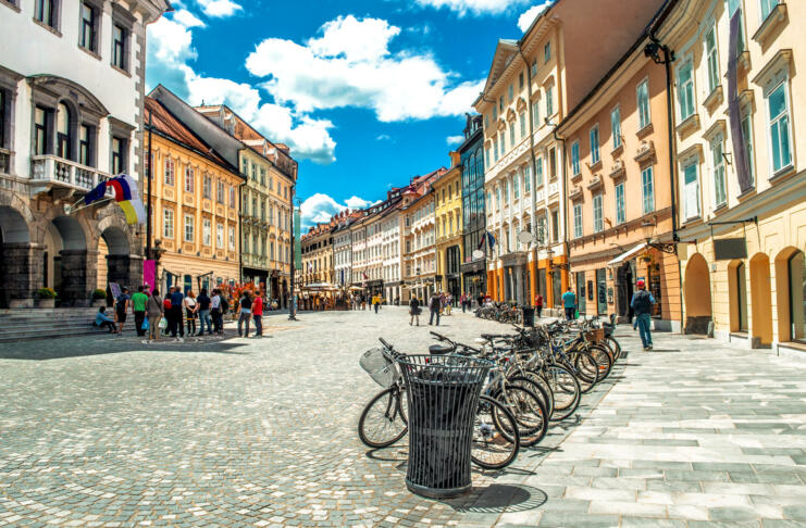 Ljubljana, Slovenia, 03/06/2013 : bycicles parked on a colorful and clean street in the historic distric of the Slovenian capital during summer