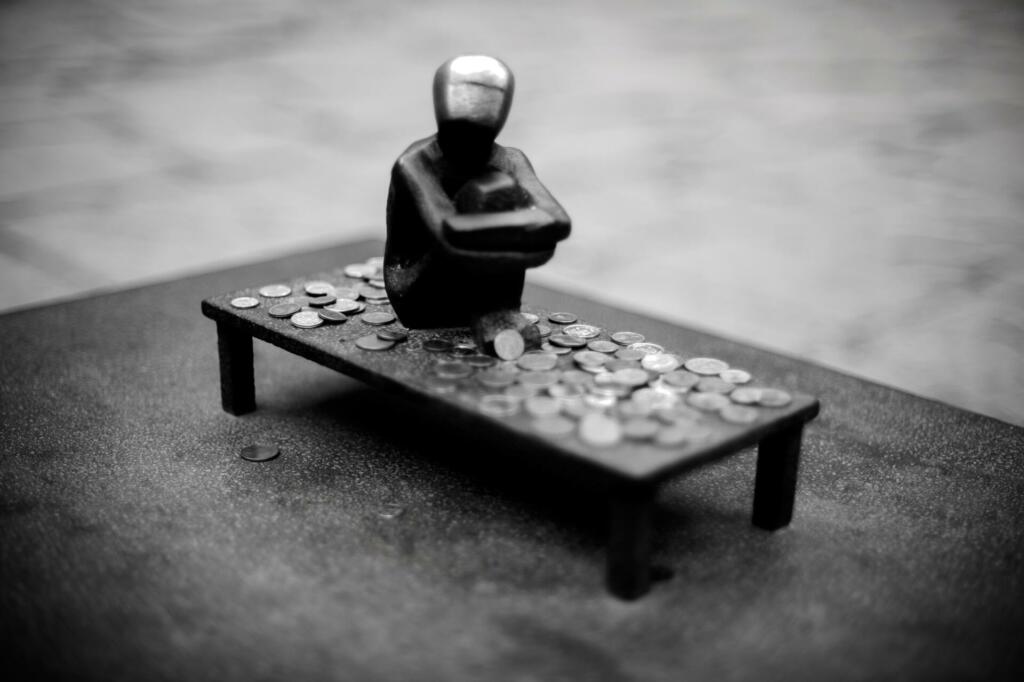 man figure on black table