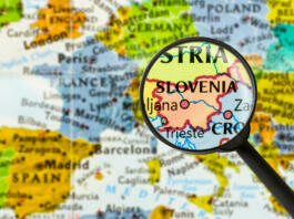 map of Republic of Slovenia through magnifying glass