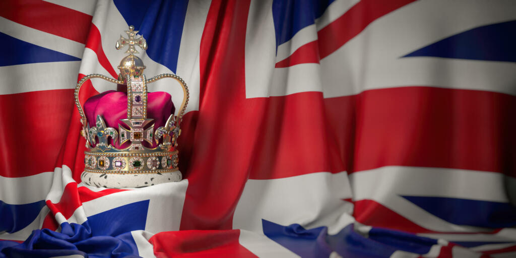 Royal golden crown with jewels on british flag. Symbols of UK United Kingdom. 3d illustration