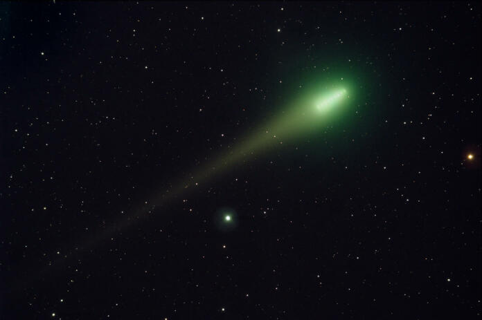 This is a time-lapse image of Comet Lulin at it's closest approach to the earth on February 24, 2009.  There are a total of 10 images stacked upon each other.  Each image exposure was 5 minutes.  If you examine the image closely, you will see 10 