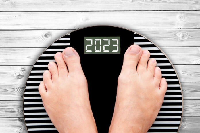 2023 feet on a weight scale, nutrition and diet new year card