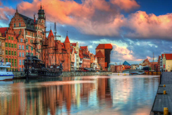 Beautiful scenery of the old town in Gdansk over Motlawa river at sunrise, Poland.