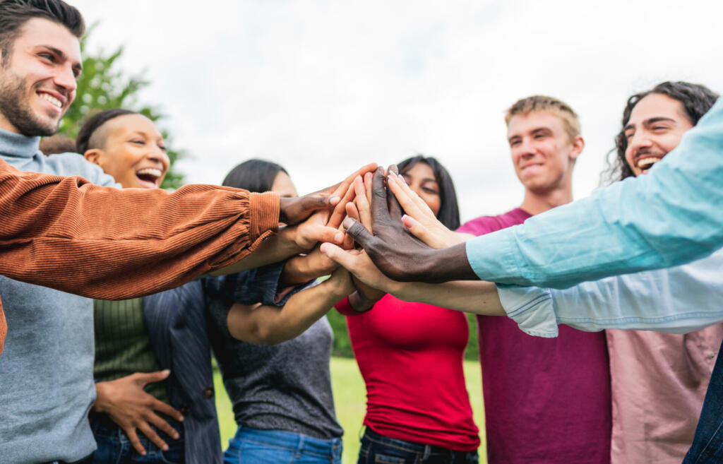 Group of young activists encouraging each other to expressing their concerns about climate changes.