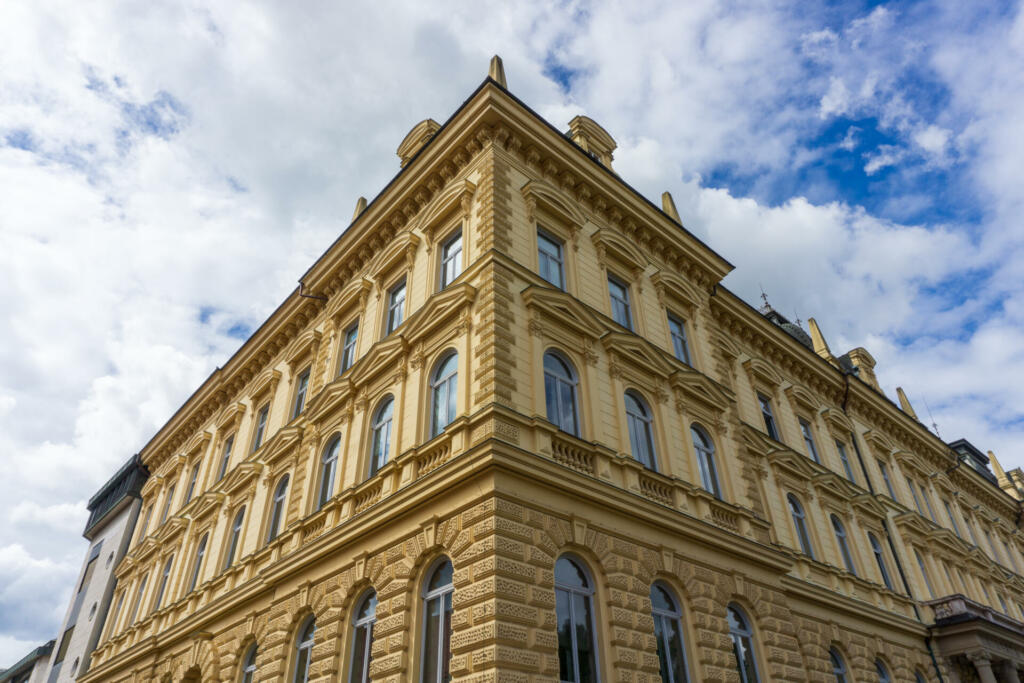 Picture of perspective of Maribor University from corner under the cloudy sky