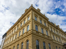 Picture of perspective of Maribor University from corner under the cloudy sky