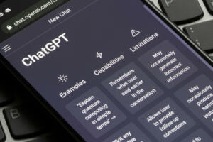 Portland, OR, USA - Dec 18, 2022: Webpage of ChatGPT, a prototype AI chatbot, is seen on the website of OpenAI, on a Google Pixel smartphone. Examples, capabilities, and limitations of the chatbot are shown before a new chat. OpenAI is an AI research and deployment company.