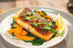 Salmon steak with carrot and spinach