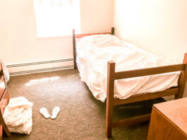 Basic white box dormitory room.