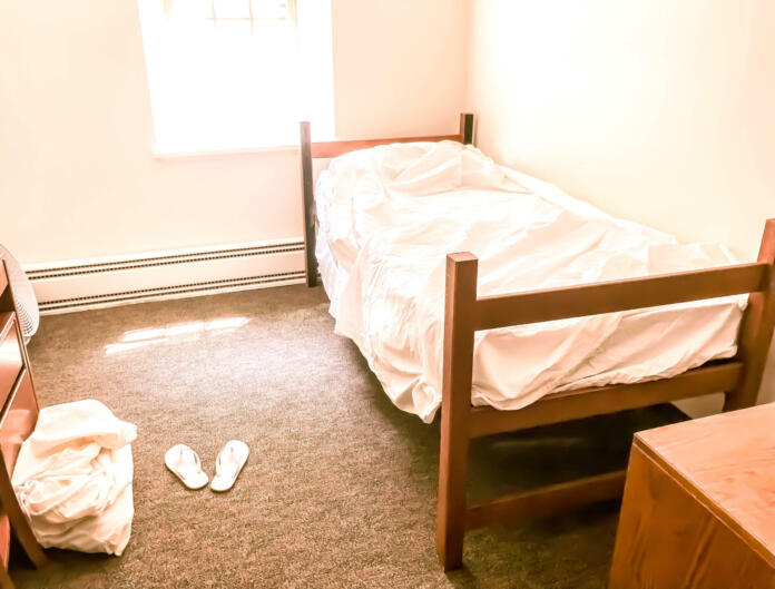 Basic white box dormitory room.