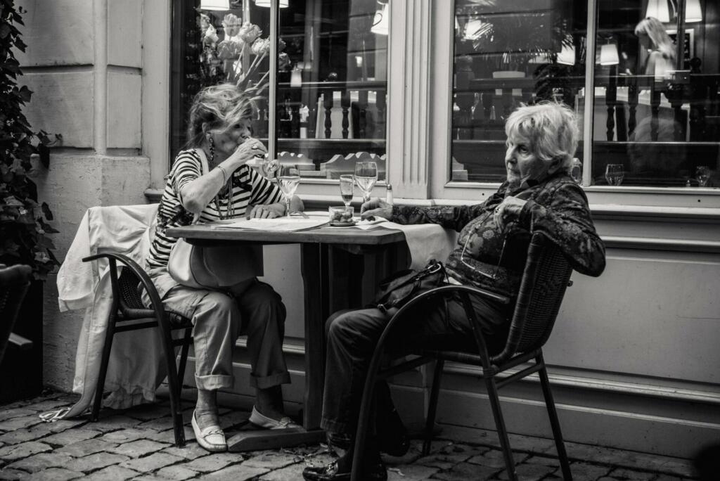 Caught these two lovely older ladies enjoying a drink and watching the life of Versailles pass them by. Classy old dames.