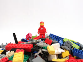 Colorado, USA - April 7, 2015: Studio shot of Lego astronaut on bricks. Legos are a popular line of plastic construction toys manufactured by The Lego Group, a company based in Denmark.