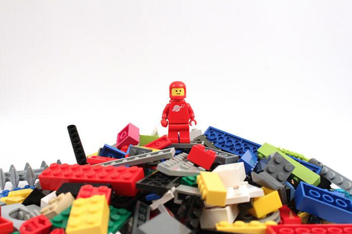 Colorado, USA - April 7, 2015: Studio shot of Lego astronaut on bricks. Legos are a popular line of plastic construction toys manufactured by The Lego Group, a company based in Denmark.