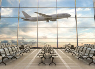 Države brez letališč: V kateri državi ne moreš pristati z letalom? Empty airport terminal lounge with airplane on background. 3d illustration
