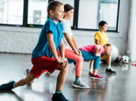 Kids warming up before training in gym