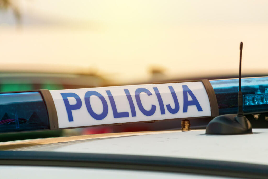 Police car roof sign (policija in croatian language), closeup with selective focus