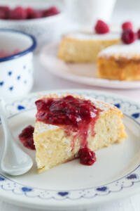 Swedish marzipan cheesecake (ostkaka) served with raspberry jam