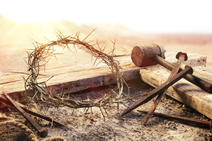 Wooden Cross With Crown Of Thorns Hammer And Bloody Nails