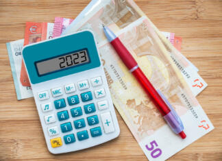 Nevladnim organizacijam na voljo razpis za male in srednje projekte 2023 numbers on a calculator and euros banknotes, new year finance, money inflation and budget concept