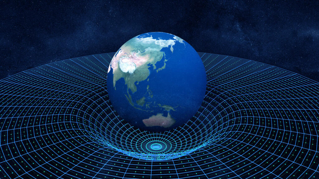 Ukrivljanje prostora-časa na primeru Zemlje.