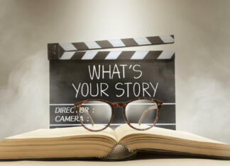 Filmi o pisateljih in pisateljicah Handwriting on movie clapperboard ;storytelling for film, cinema and video photography concept