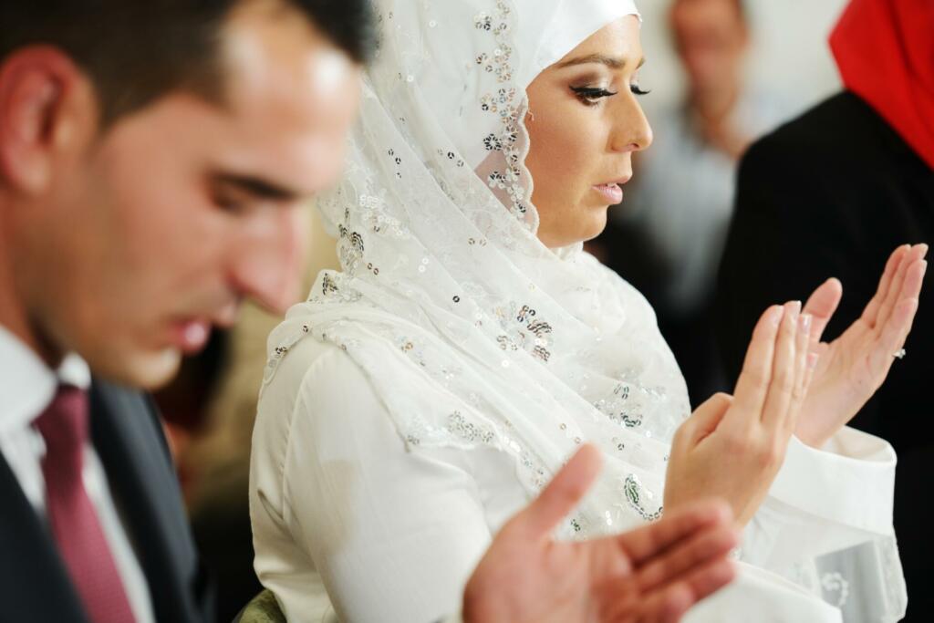 Muslim bride and groom at the mosque during a wedding ceremony